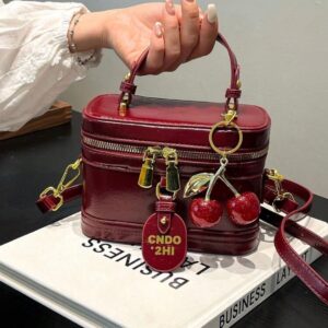 BOLSA BURDEOS CON DORADO