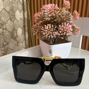 Lentes negros cadena dorada