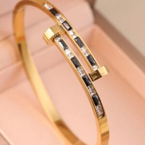 Pulsera negra y dorada
